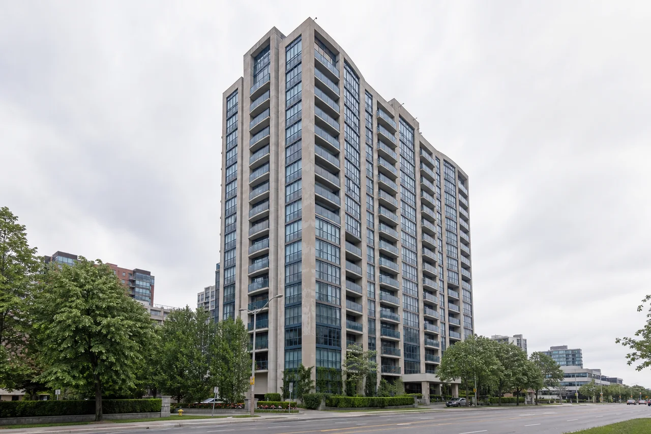 Established high-rise condominium tower in a Toronto residential streetscape.